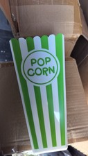 Plastic Popcorn Containers Red  White, green, and purple Reusable full Boxes.