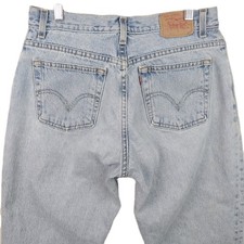 Vintage Levi's 550 Relaxed Fit Tapered Jeans Women's Size 8 Light Wash 2003