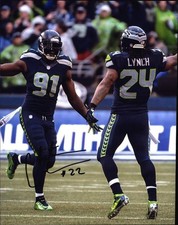 Chris Clemons signed NFL football 8x10 photo W/Cert Autographed 05