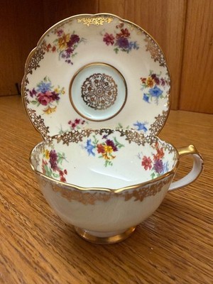 Paragon Fine Bone China By Appointment to Her Majesty. Cup/Saucer. Floral. Gold