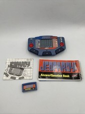 Tiger Electronics Jeopardy Hand Held Game 1995 with Answer Book Manual E1