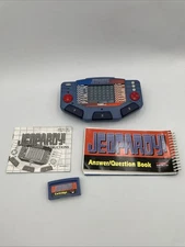 Tiger Electronics Jeopardy Hand Held Game 1995 with Answer Book & Manual E1