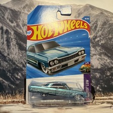 Hot Wheels Chevy 64 Impala Super Treasure Hunt STH w/ Protector crease on hanger