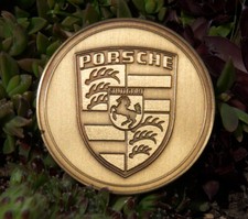 VINTAGE AUTOMOBILE CAR BADGE # PORSCHE DRIVING AT ITS MOST BEAUTIFUL FORM