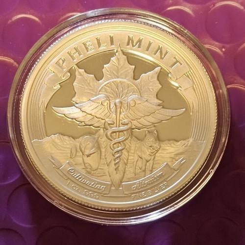 Two Wolfs; Pheli Mint; 1 Troy oz .999 Pure Silver Art Round; In Capsule - Picture 2 of 2