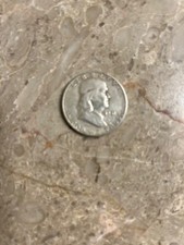 Rare 1951 Benjamin Franklin half dollar coin. In prestige shape for the year.