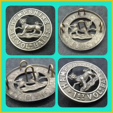 A White metal helmet plate centre for HAMPSHRE 1st VB 4 Loops intact