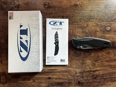 Zero Tolerance 0393 titanium handle with glow in dark CF inlay Hinderer design