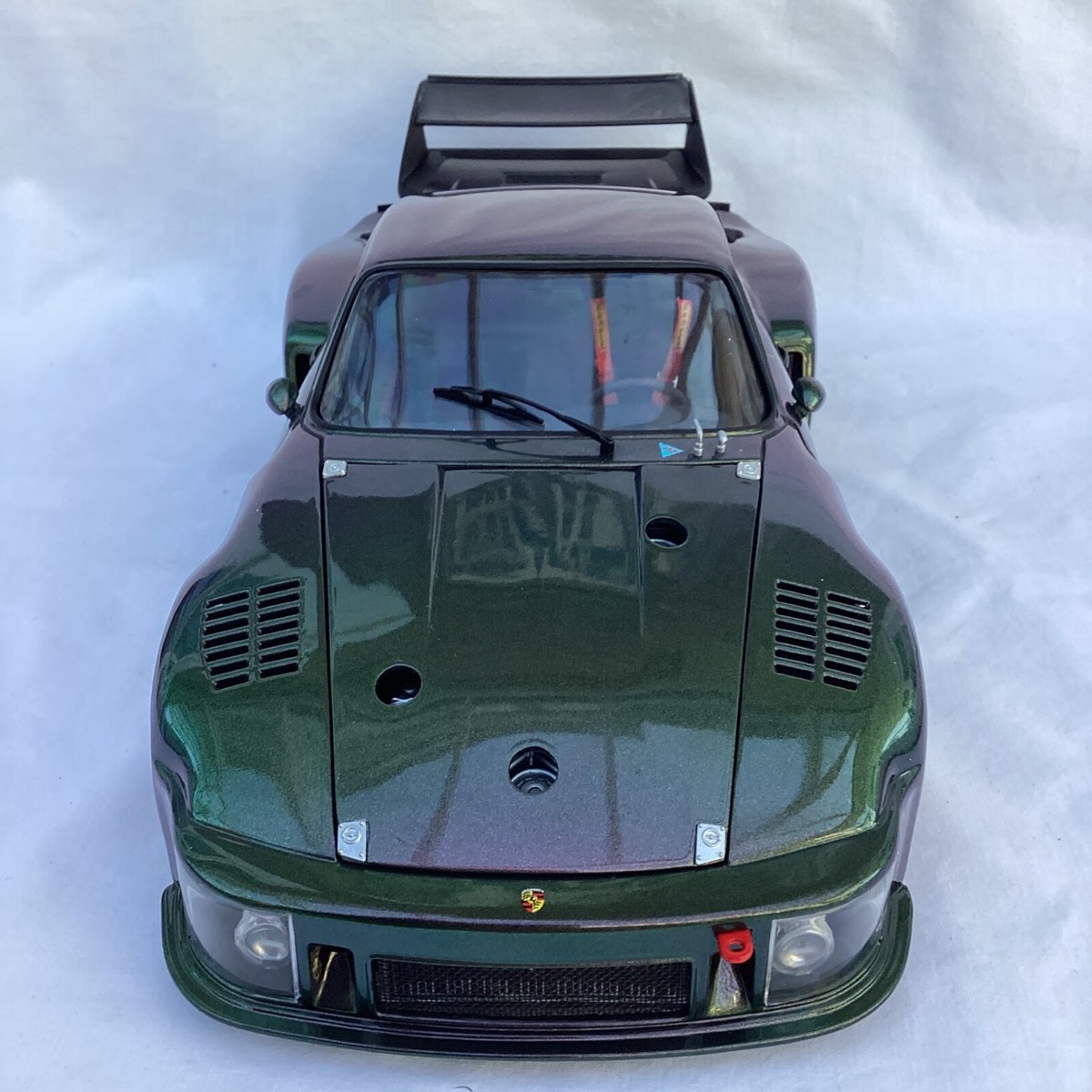 1:18 1976 Porsche 935 in Standox Avus Galaxy Iridescent. Exoto