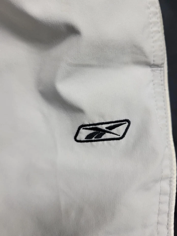 Pantalones deportivos Reebok para hombre talla grande forrados negros grises Foto 3 de 4