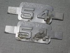 1954 Montana passenger car license plate tab pair