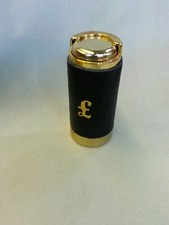 One pound coin holder one pound leather covered