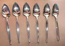 WM Rogers MFG Co Stainless Serrated Grapefruit Spoons 6 1 not matching