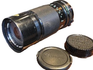 Canon 70-150mm f4.5 manual focus FD mount lens with built-in lens hood + Caps