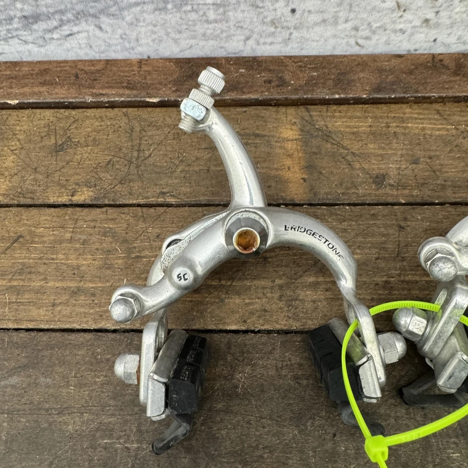 Juego de frenos de pinza de tracción lateral Bridgestone vintage delanteros traseros Japón 5583 tuerca años 80 Foto 4 de 4