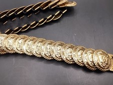 Coined Lionhead Scalloped Stretchable Romans Gold Colored Belt.