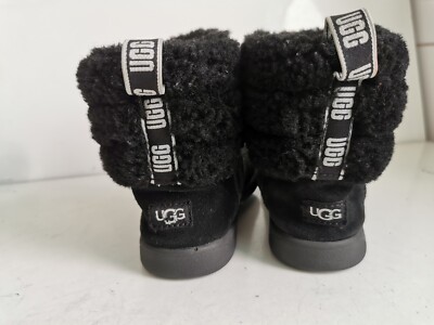 UGG Australia UK 10 EU 28,5 MÄDCHEN FLAUSCHIG MINI GESTEPPT SCHWARZ WILDLEDER FELL STIEFELETTEN