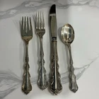 Angelique by International Sterling Silver individual 4 Piece Place Setting