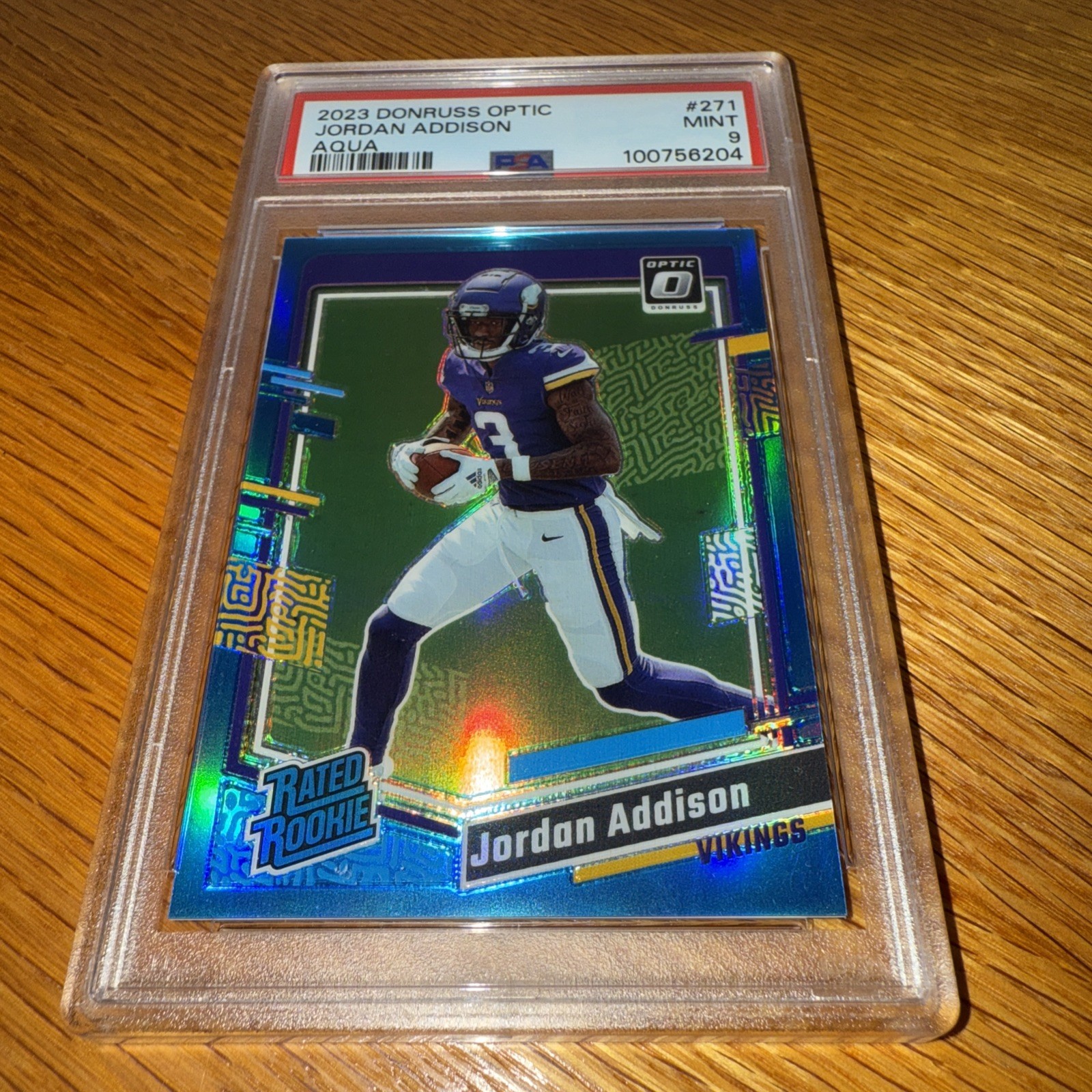 2023 Panini Donruss Optic Rated Rookie Jordan Addison #271 Aqua Prizm /299 PSA 9