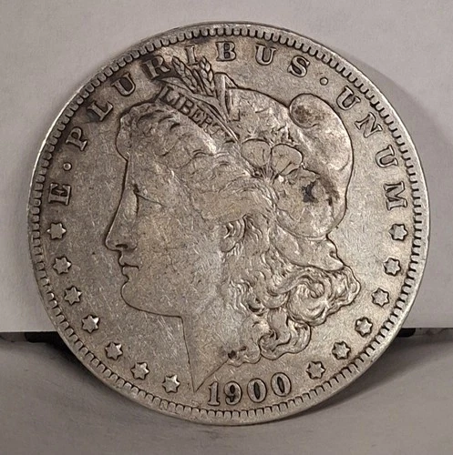 1900 O/CC Morgan Silver Dollar. Nice VF Original Looking Coin. 90% Silver.