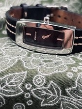 DKNY Women's Rectangle Analog Quartz Watch Black Dial Black Leather Strap 50m