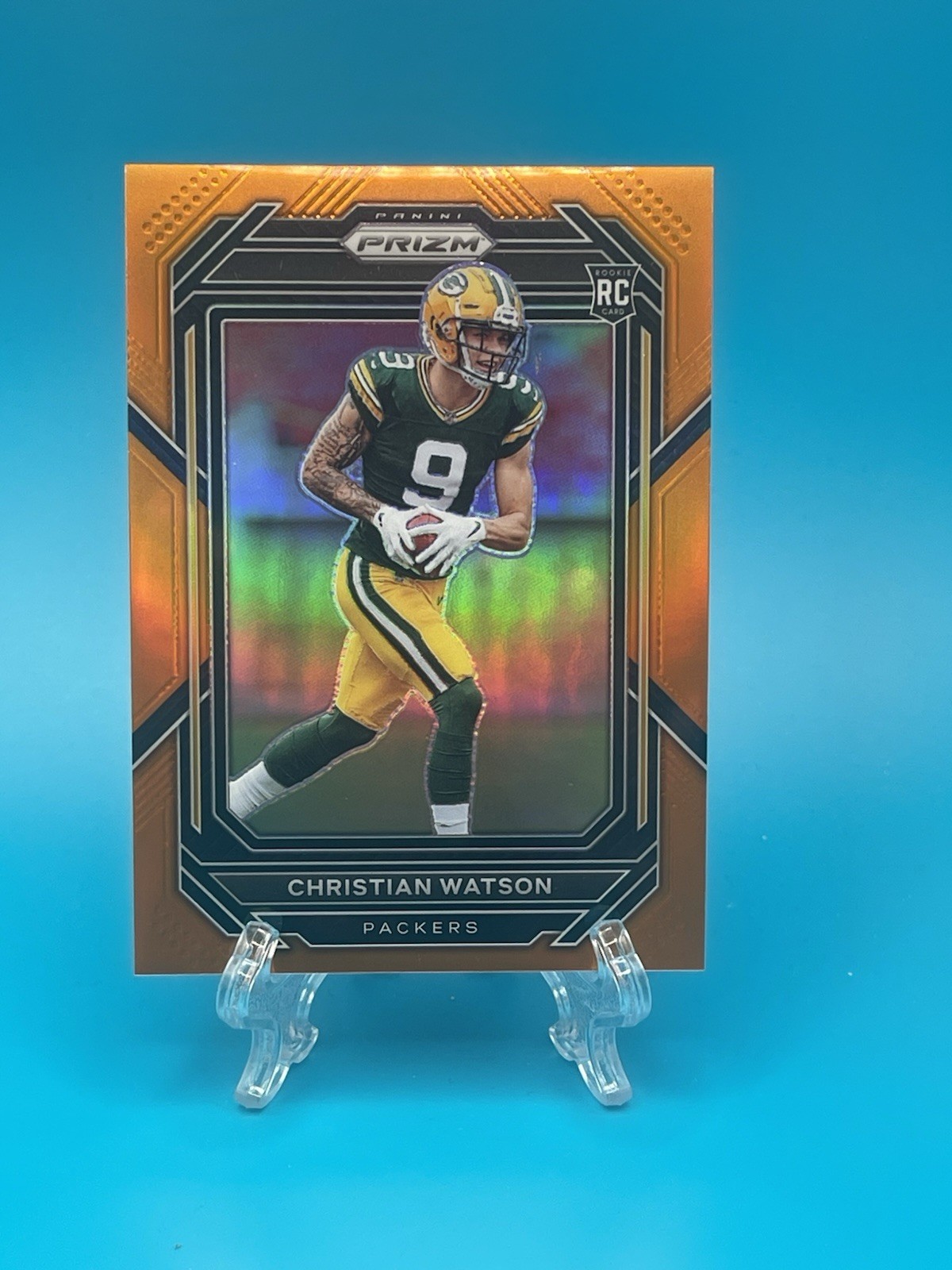 2022 Panini Prizm Christian Watson #314 Orange Prizm /249 (RC)