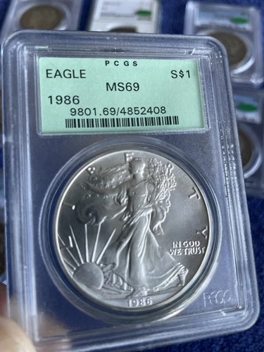 1986 AMERICAN SILVER EAGLE EARLY PCGS 3.1 Holder MS69   RARE
