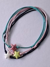 Collana choker cordino nylon colorato stella marina ceramica dorato fatto a mano