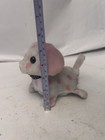 white with pink polka dot yipping puppy toy broken bag leg made in China — photo 2