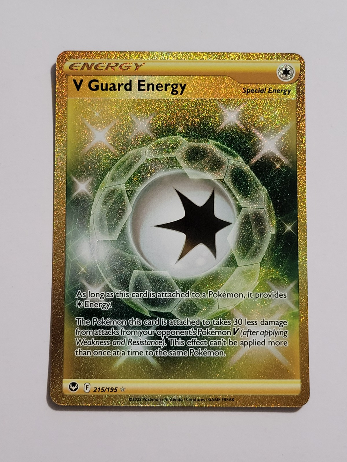 V Guard Energy # 215 Gold Secret Rare Silver Tempest Pokemon Card NM