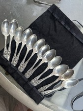 12 sterling silver soup spoons, 303 grams