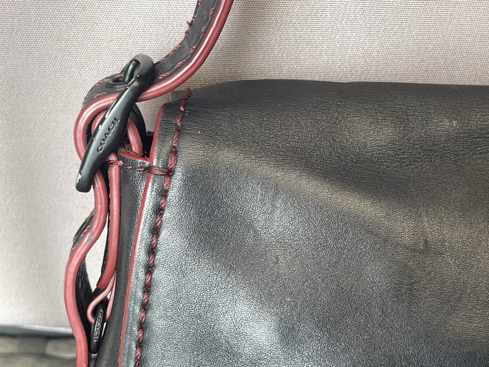 Coach saddle bag Black leather bag with red contrast stitching and edged details image 7