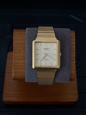 Vintage Orient C75HB7-40 BJ Quartz Vintage Men's Gold Tank Wristwatch Champagne
