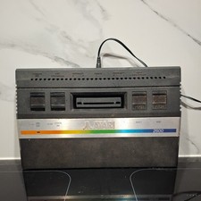 Atari 2600 classic games console with one game and two controllers 