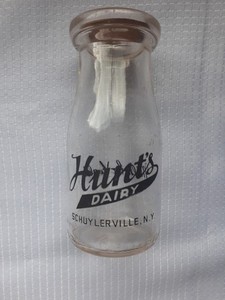 Vintage half pint Hunts Dairy glass milk bottle with cork