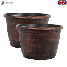Image of Sustainable Round Copper Planter with Drainage - Perfect for Garden & Patio