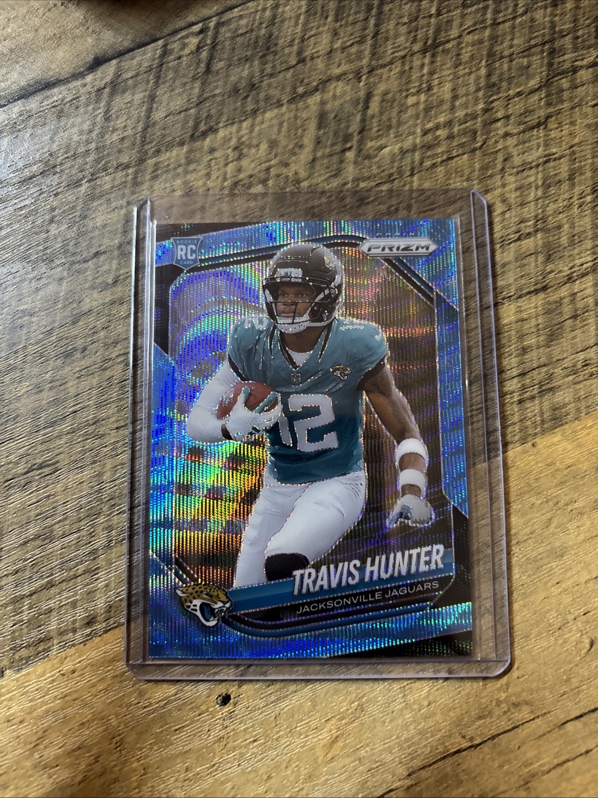 2025 Panini Prizm Football Travis Hunter RC Blue Wave Prizm 10/230 #301