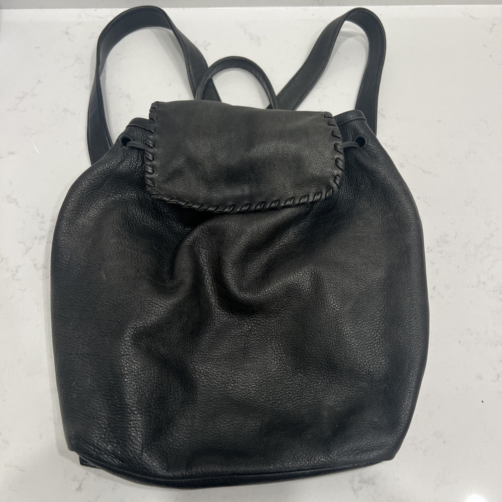 LAGGO TASSEL DRAWSTRING BAG BACKPACK BLACK PEBBLE… - image 1