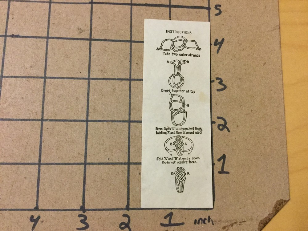 Vintage PUZZLE related paper: EARLY SOLUTION: METAL RING Take aprart put togethe