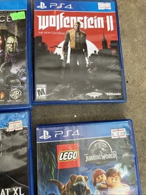 PS4 Video Game Lot 4 Wolfenstein 2,jurassic World,mortal Kombat Injustice D4