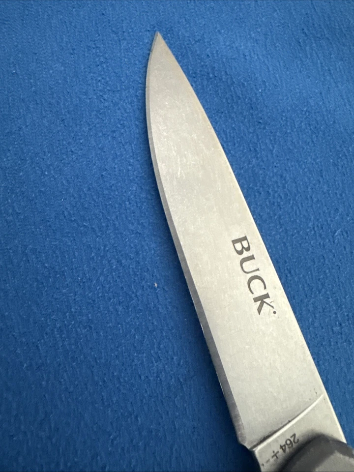 Cuchillos Buck 264 Cavalier mango de aluminio y fibra de carbono + billetera Ninja Foto 4 de 4