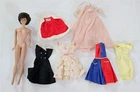 X-838 VINTAGE 1960'S MATTEL BARBIE BRUNETTE BUBBLE CUT DOLL WITH TAGGED CLOTHING