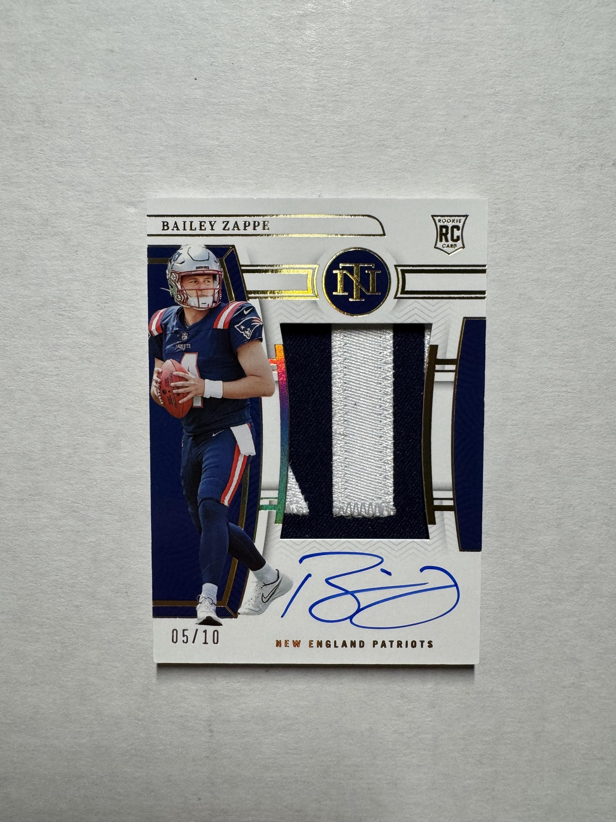 2022 Panini National Treasures #195 Bailey Zappe Holo Gold Rookie Patch Auto /10