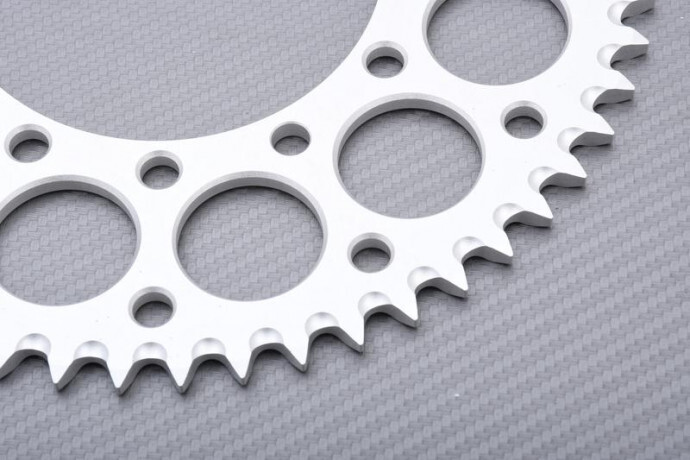 Couronne ultra légère RENTHAL 51 dents pas 428 gain de puissance KX 100