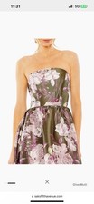 Mac Duggal strapless ball gown features a full A-line skirt and ruffled hem 