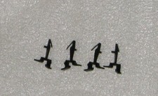 4 Lionel HO Pin-Down Couplers. Part  0766-51