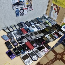 Bundle of 64 vintage phones nokia n70 n73 6220 etc check description please