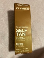 Clarins Self Tan by Clarins, 4.2 oz Self Tanning Milky Lotion New