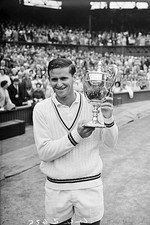 Roy Emerson holds up the trophy after his straight sets victory 1960s Old Photo