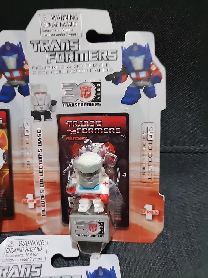 Transformers 30th Anniversary Figurine w/ 3D Puzzle Piece & Base 5 Pack - Image 4 of 4